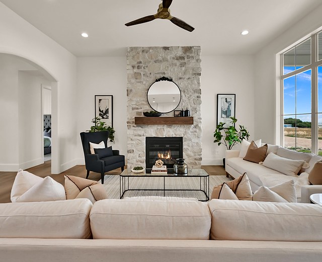 Great room with a floor-to-ceiling stone fireplace and 11-foot ceilings, 993 N 75 W, Mendon